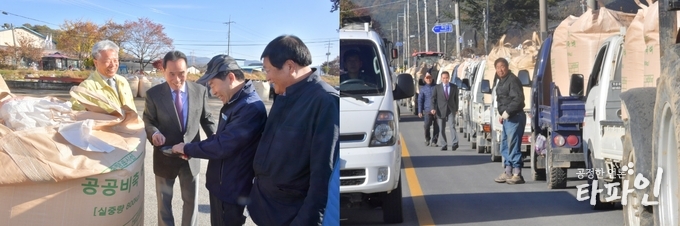 황숙주 순창군수가 2019년산 공공비축미(건조벼)를 매입 현장에서 농민들과 대화를 나누고 있다.(순창군 제공)2020.2.7/타파인